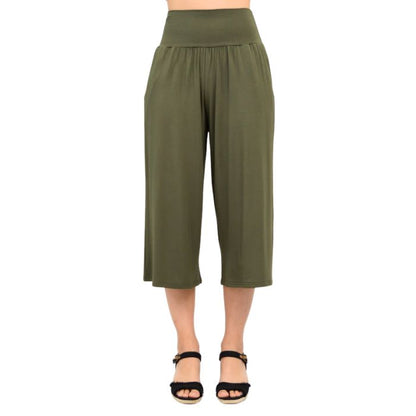 female model wearing khaki green gaylene capri pants front view on white background