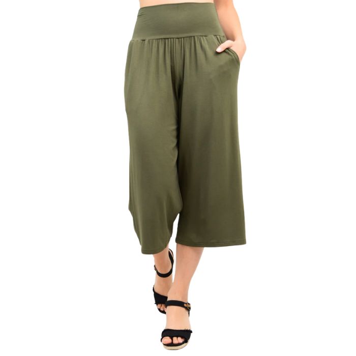 female model wearing khaki green gaylene capri pants front view on white background