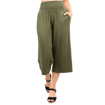 female model wearing khaki green gaylene capri pants front view on white background