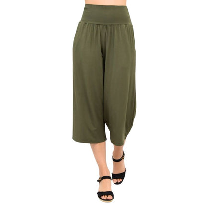 female model wearing khaki green gaylene capri pants front view on white background