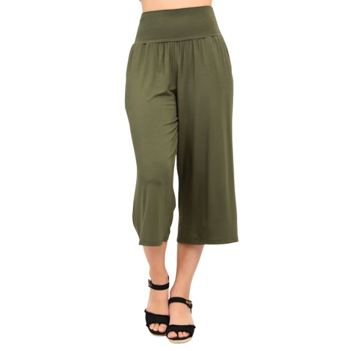 female model wearing khaki green gaylene capri pants front view on white background