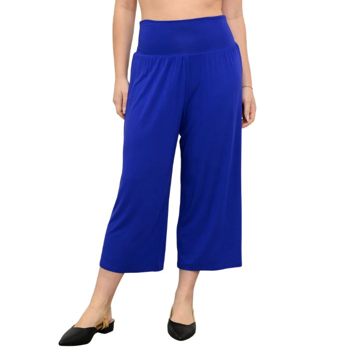female model wearing violet purple gaylene capri pants front view on white background
