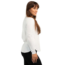 top of female model wearing white georgia crew top side view on white background