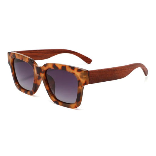 gorgona sunglasses tortoise frames and dark lenses over view on white background
