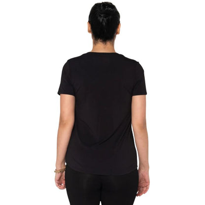 top of female model wearing black gracie crew neck t-shirt back view on white background