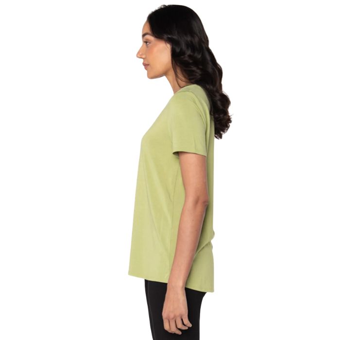 top of female model wearing cirton green gracie crew neck t-shirt side view on white background