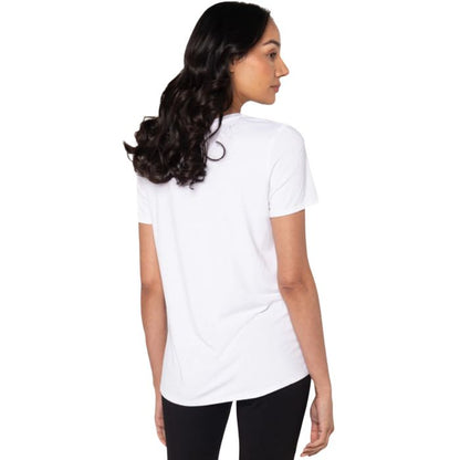 top of female model wearing white gracie crew neck t-shirt back view on white background 