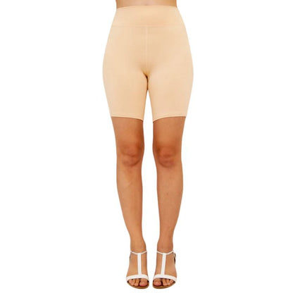 female model wearing beige brown hallie shorts front view on white background
