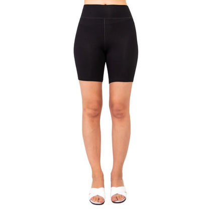 female model wearing black hallie shorts front view on white background