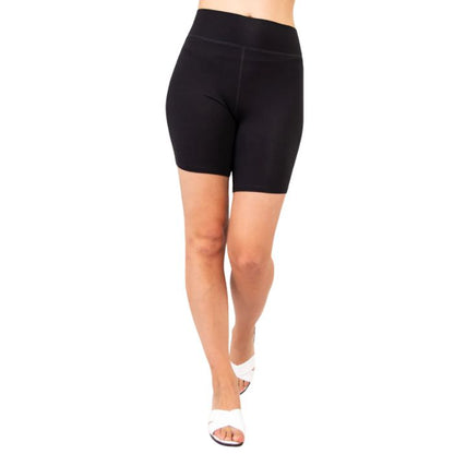female model wearing black hallie shorts front view on white background