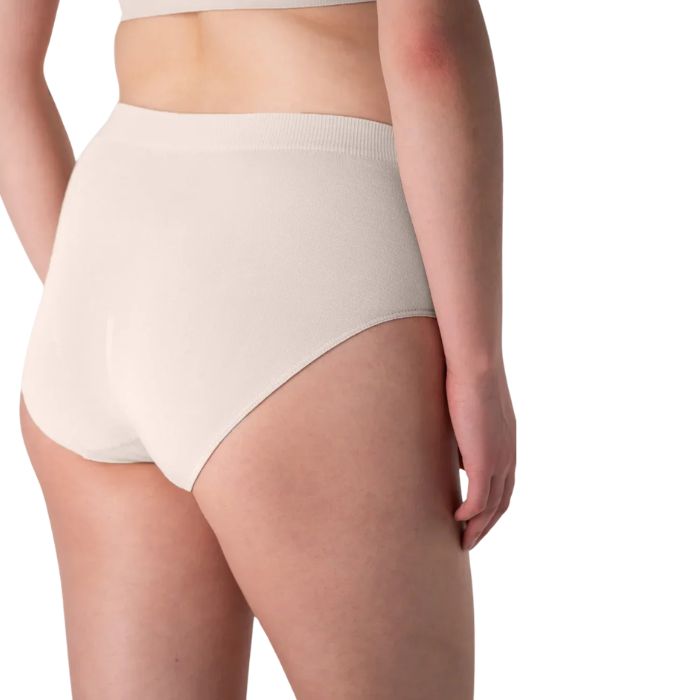 body of female model wearing cream white high waisted full brief back view on white background