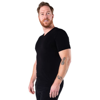 male model wearing black huron v-neck t-shirt side view on white background