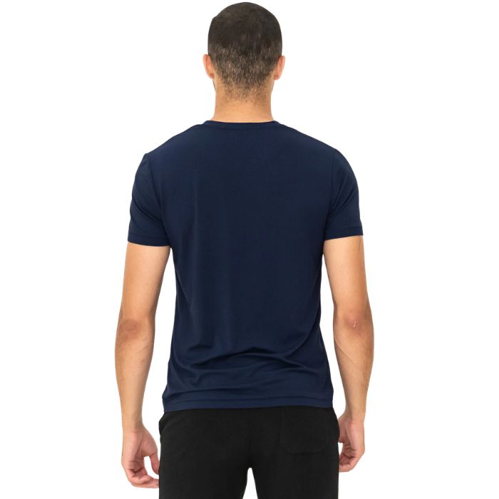 male model wearing ink blue huron v-neck t-shirt back view on white background