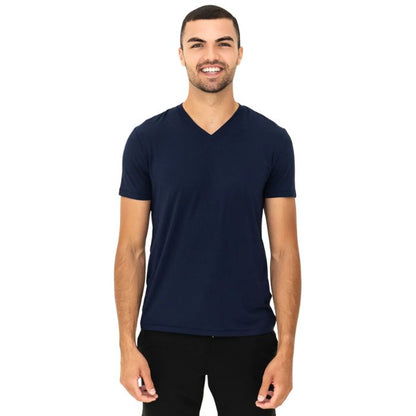 male model wearing ink blue huron v-neck t-shirt front view on white background