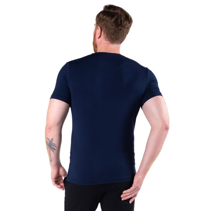 male model wearing ink blue huron v-neck t-shirt back view on white background