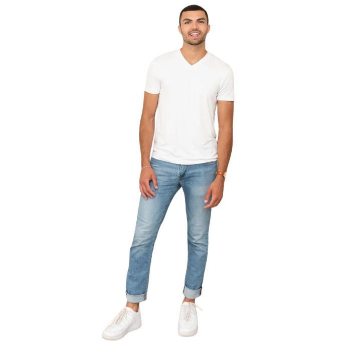 male model wearing white huron v-neck t-shirt and blue jeans front view on white background