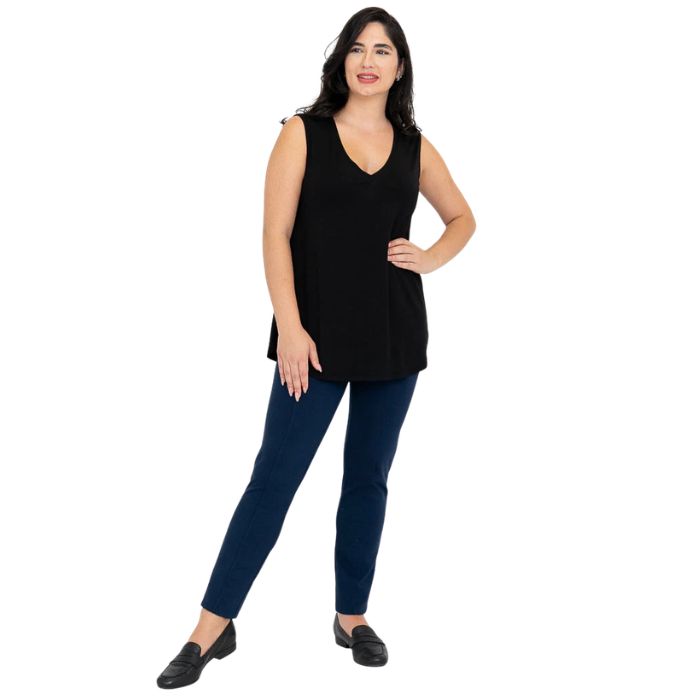 female model wearing black jackie tank top and indigo blue nadia pants front view on white backround