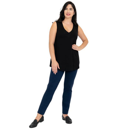 female model wearing black jackie tank top and indigo blue nadia pants front view on white backround