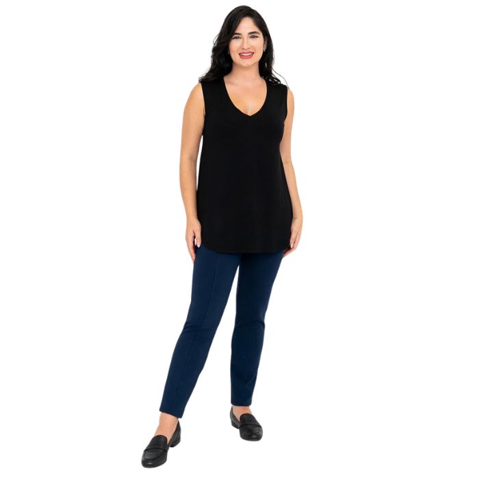 female model wearing black jackie tank top and indigo blue nadia pants front view on white backround