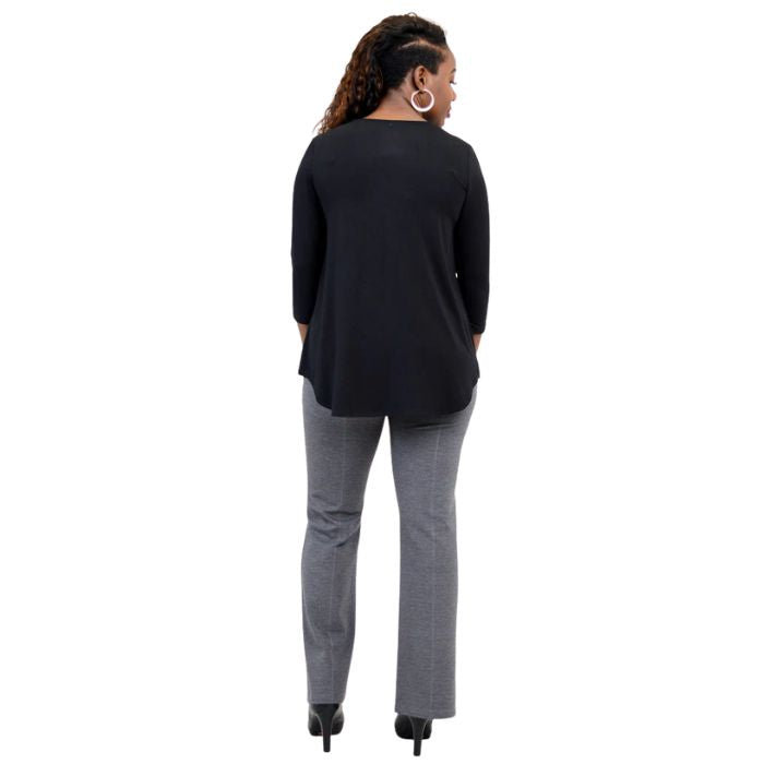 female model wearing black jackie top and granite grey daya pants back view on white backround