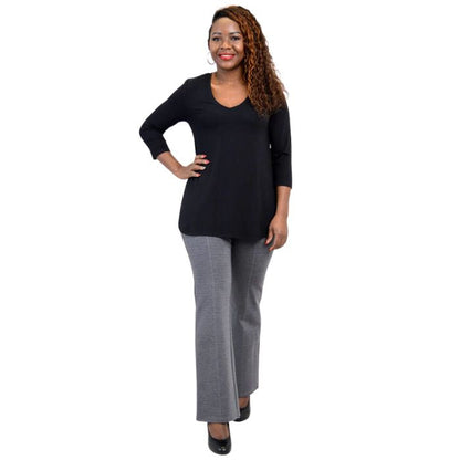 female model wearing black jackie top and granite grey daya pants front view on white backround