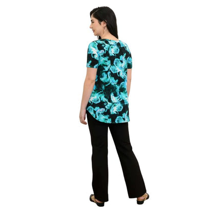 female model wearing charisma print jackie top and black daya pants back view on white backround