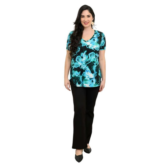 female model wearing charisma print jackie top and black daya pants front view on white backround