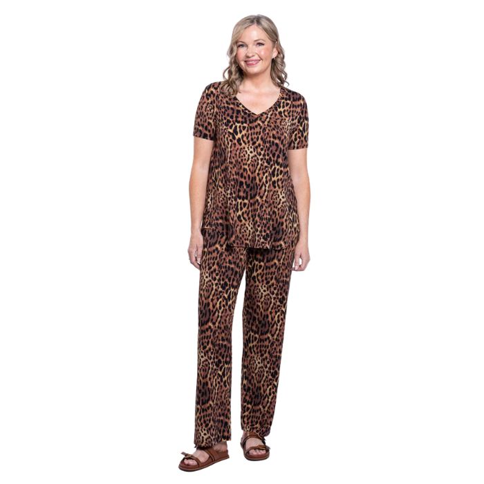 female model wearing chocolate leopard print jackie top and chocolate leopard print dream pants front view on white backround