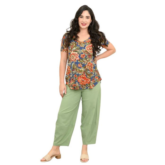 female model wearing khaki vintage print jackie top and sage green boardwalk pants front view on white backround