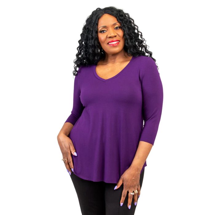 female model wearing royale purple jackie top front view on white backround