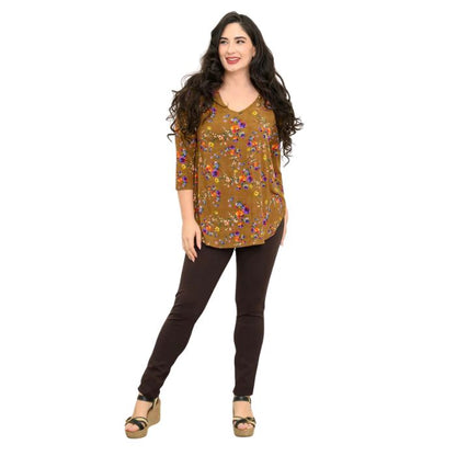 female model wearing sand pansy print jackie top and coffee brown nadia pants front view on white backround
