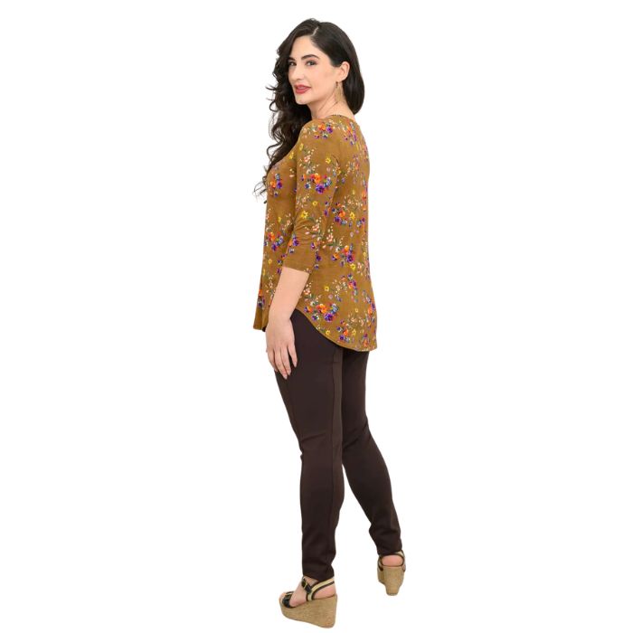female model wearing sand pansy print jackie top and coffee brown nadia pants side view on white backround