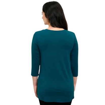 female model wearing teal green jackie top back view on white backround
