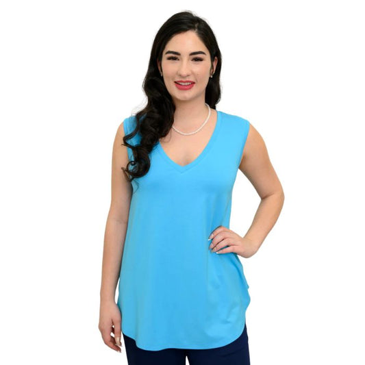 female model wearing turquoise blue jackie tank top front view on white backround