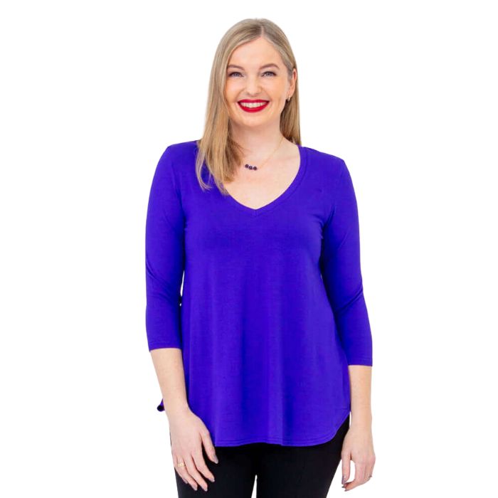 female model wearing violet purple jackie top front view on white backround