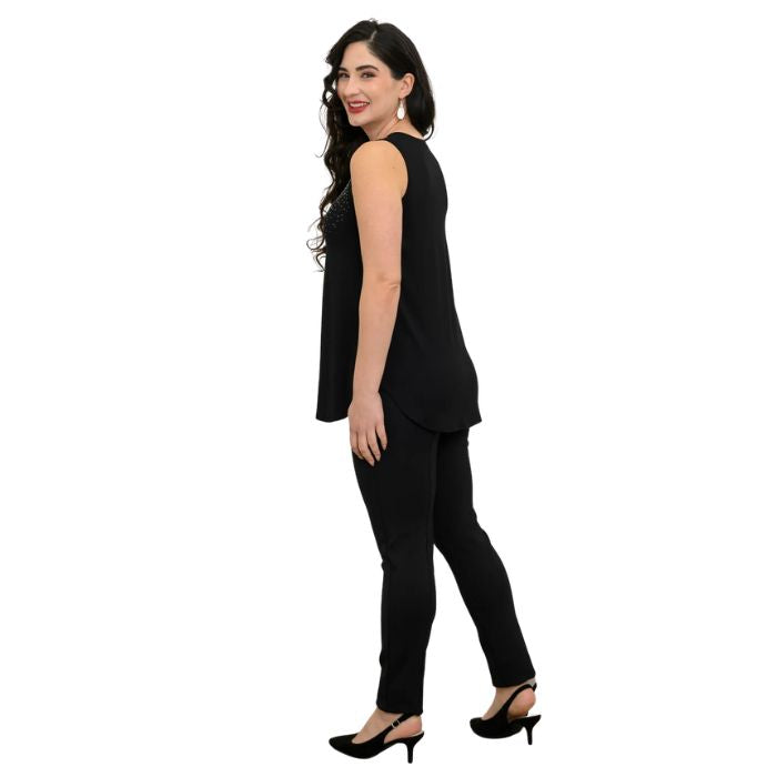 female model wearing black diamond jazz tank top and black nadia pants side view on white background
