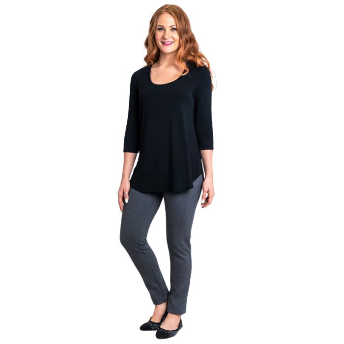 female model wearing jazz black three quarter sleeve top and nadia black pants front view on white background