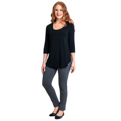 female model wearing jazz black three quarter sleeve top and nadia black pants front view on white background