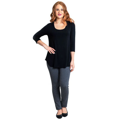 female model wearing jazz black three quarter sleeve top and nadia black pants front view on white background
