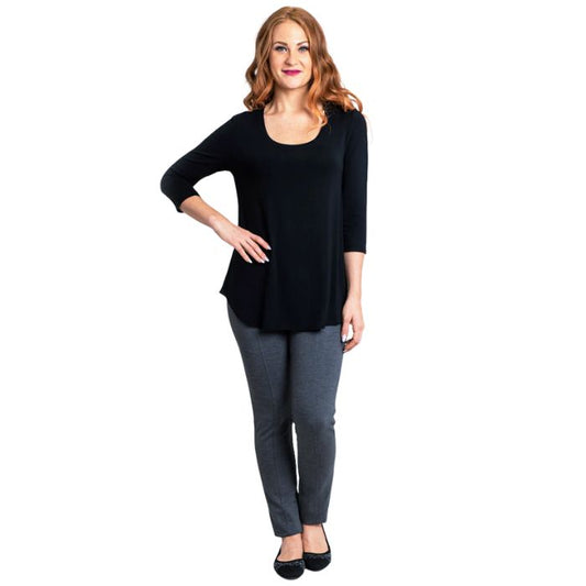 female model wearing jazz black three quarter sleeve top and nadia black pants front view on white background