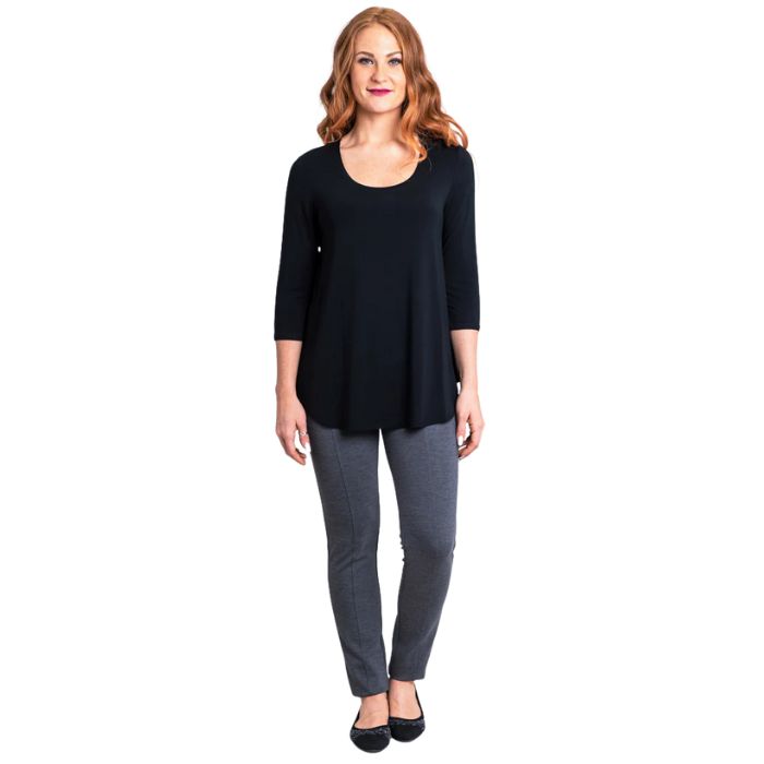 female model wearing jazz black three quarter sleeve top and nadia black pants front view on white background