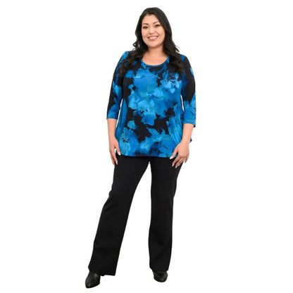 a women wearing blue space print jazz  top and black daya pants front view on white background