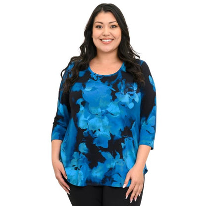 a womenl wearing blue space print jazz  top waist up front view on white background