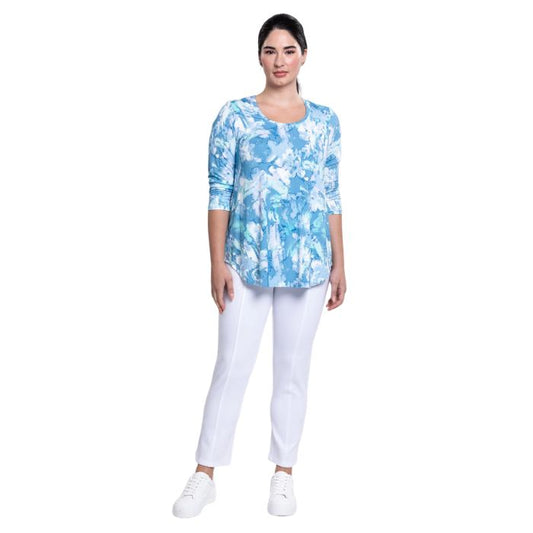 female model wearing denim cloud print jazz top and white nadine croppped pants front view on white background