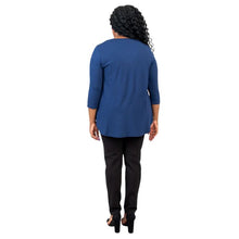 female model wearing jazz indigo blue three quarter sleeve top and nadia black pants back view on white background