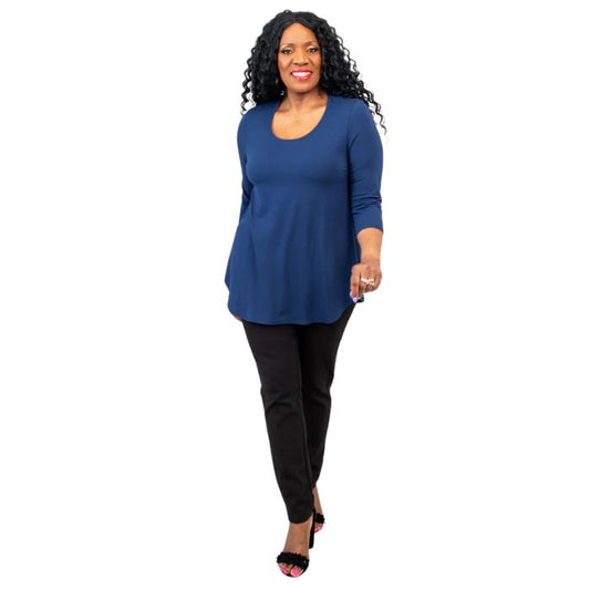 female model wearing jazz indigo blue three quarter sleeve top and nadia black pants front view on white background