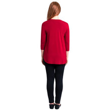 female model wearing jazz lipstick red  three quarter sleeve top and nadia black pants back view on white background