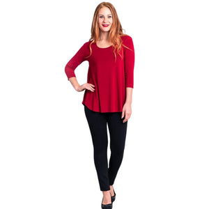 female model wearing jazz lipstick red  three quarter sleeve top and nadia black pants front view on white background