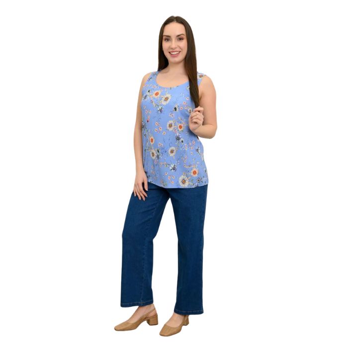 female model wearing peri daisy print jazz tank top and denim blue jeans front view on white background