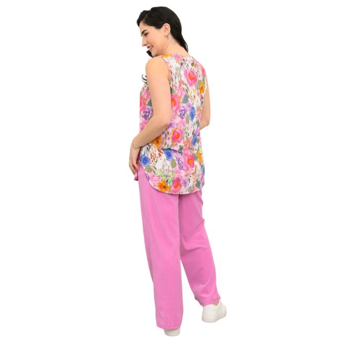 female model wearing pink bouquet print jazz tank top and pink parker pants back view on white background